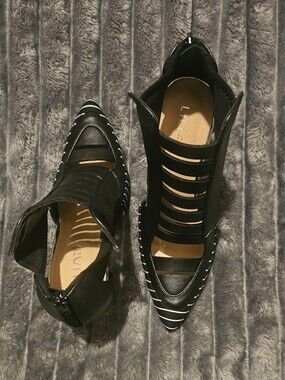 Black abd White Strappy Pointed Toe Heels with Contrast Strips.
